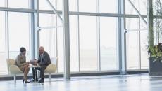 Two executives conferring 