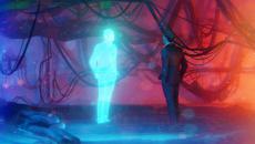 Digital person standing next to a physical person