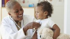 Healthcare professional with infant