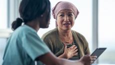 Healthcare professional consulting with patient