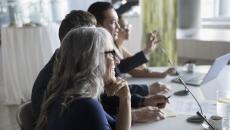 Executives gathered in a meeting