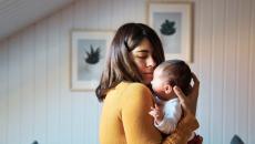 Parent holding baby