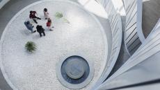 Employees gathering in an atrium 
