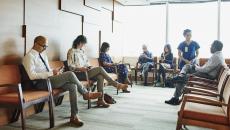 Patients sitting in a physician waiting room