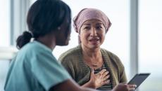 Healthcare professional consulting with patient 