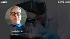 Russ Lebovitz, AmprionScientist_using microscope Photo by Chokniti Khongchum/pexels