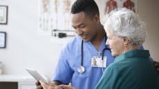 Nurse consulting with patient