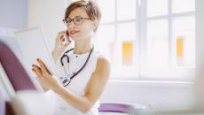 Healthcare provider holding a chart