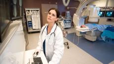 A doctor reviewing a patient's scan