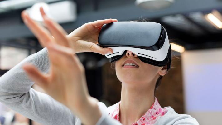 A person using virtual reality glasses