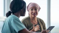 A cancer patient consulting with a doctor