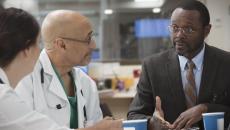 Clinicians, administrator in conference