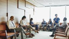 Patients sitting in a waiting room